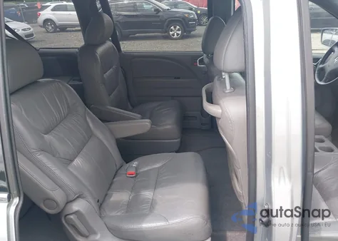 2010 Honda Odyssey Ex-L z USA, uszkodzony, nr VIN 5FNRL3H64AB107077